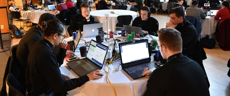 VMI cadets work on laptops