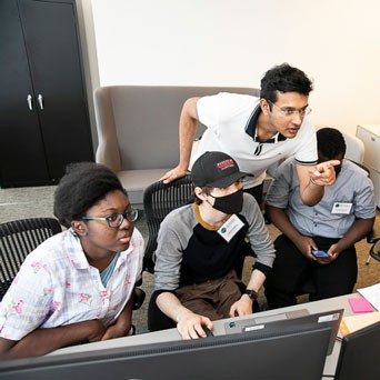 Students work on a project at the Commonwealth Cyber Initiative's Cyber Camp