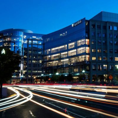 exterior night view of building with traffic lights