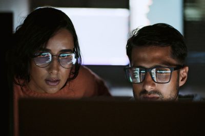 two people looking at a computer screen