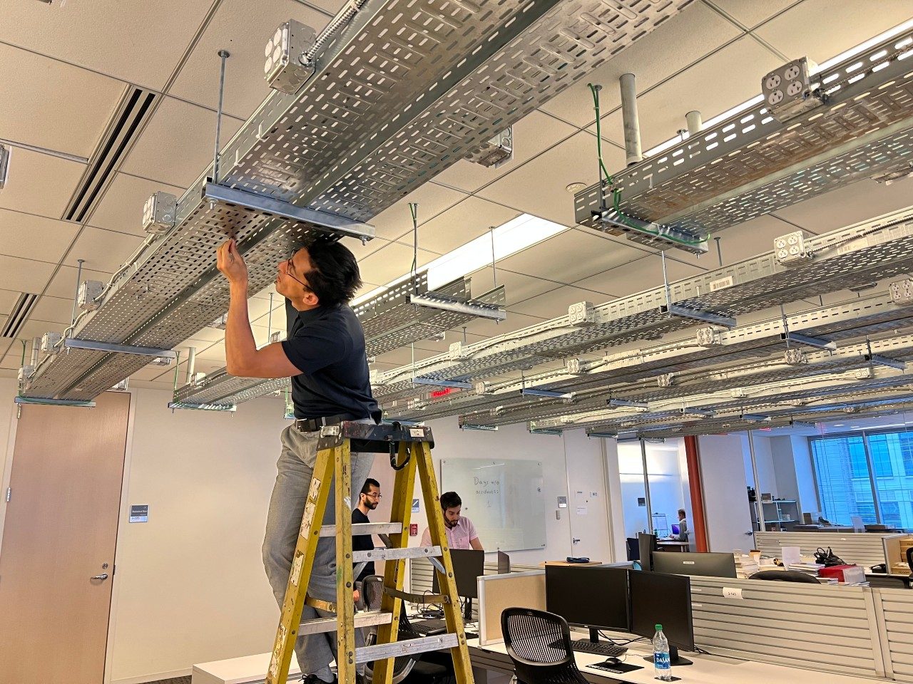 CCI xG Testbed Director Aloizio P. DaSilva installing Power Delivery Units (PDUs), which allow researchers to remotely turn radios on and off.