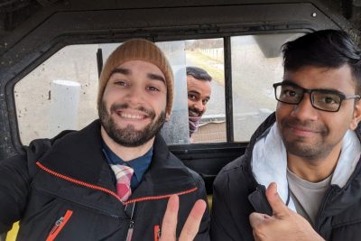Three CCI researchers in a truck