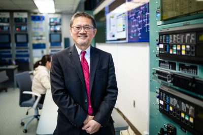 Chen-Ching Liu stands in the Power and Energy Center Lab at Virginia Tech's Blacksburg campus.