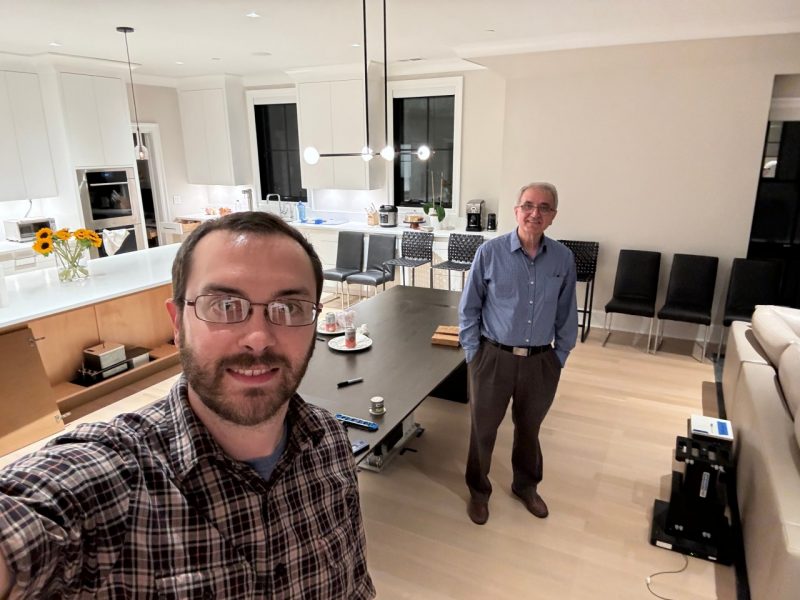 Two people in a residential kitchen